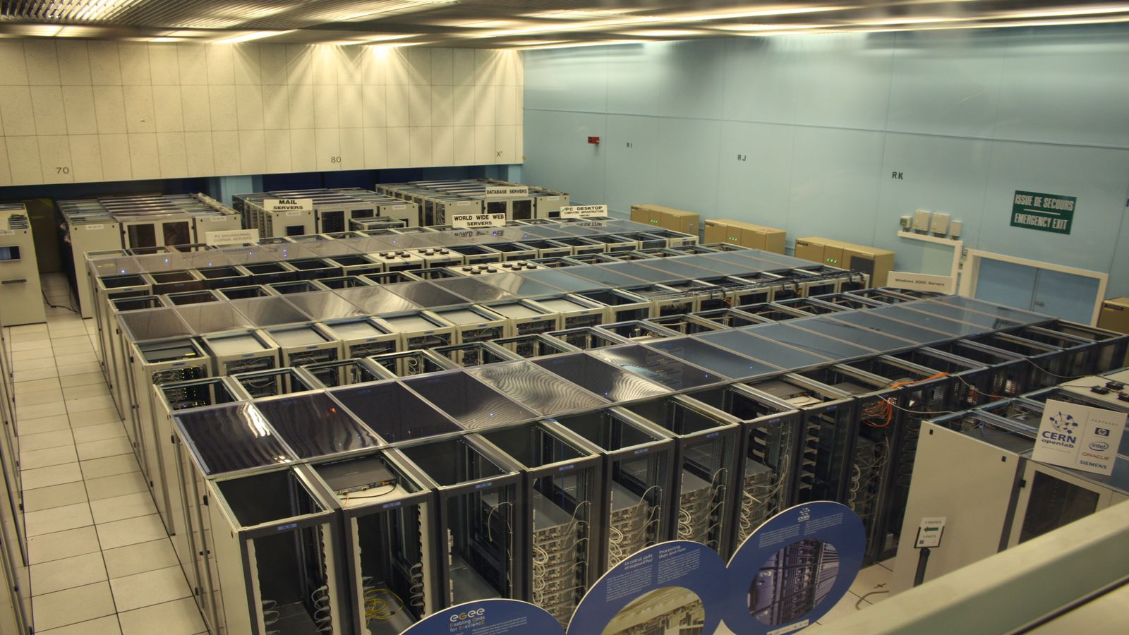 Long aisle between server cabinets in a research data center.